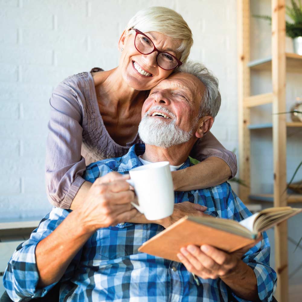 Portrait of Smiling and Hopeful Senior Couple after visiting Scout Advocacy